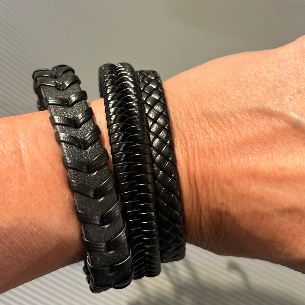 Set of three adjustable black leather bracelets